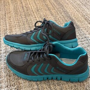 Black and Blue Athletic Shoes with Breathable Mesh and Chevron Design